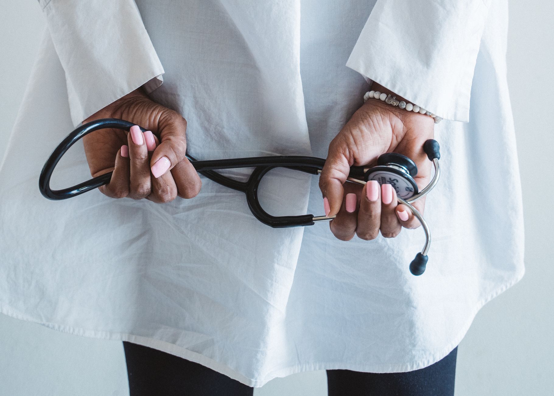 A medical professional holding a stethoscope in a clinical setting. — Top-Rated Best Orthopedic Doctor in Tampa for Comprehen